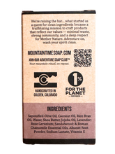 Bar of soap with a label on a white background